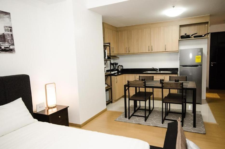 Prime Avant Bgc Location Apartments By Ph Staycation Manila Eksteriør bilde
