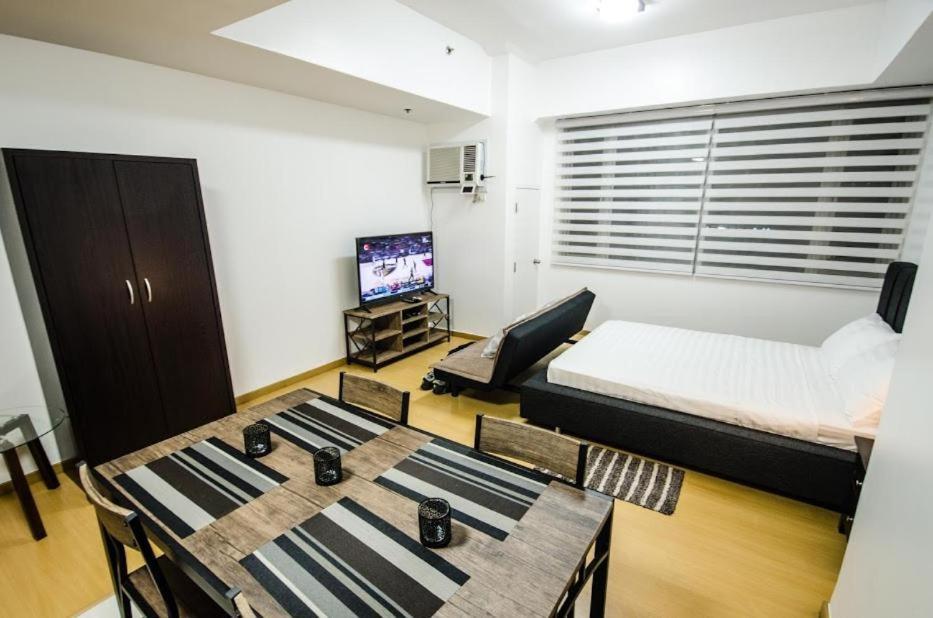 Prime Avant Bgc Location Apartments By Ph Staycation Manila Eksteriør bilde