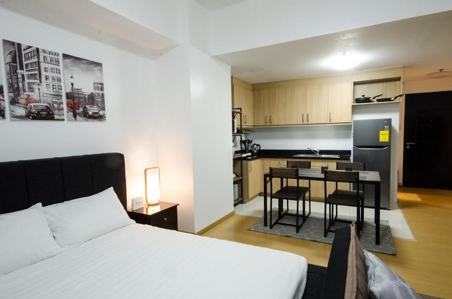Prime Avant Bgc Location Apartments By Ph Staycation Manila Eksteriør bilde