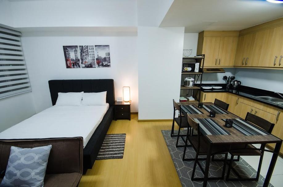 Prime Avant Bgc Location Apartments By Ph Staycation Manila Eksteriør bilde