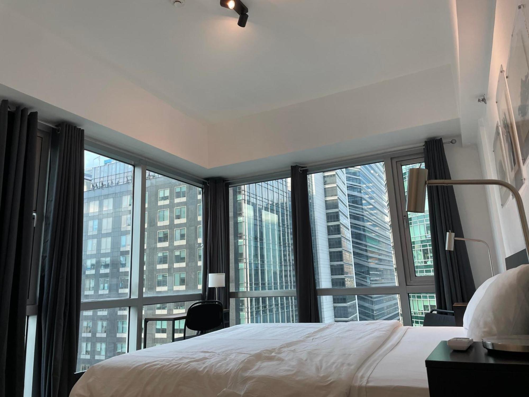 Prime Avant Bgc Location Apartments By Ph Staycation Manila Eksteriør bilde