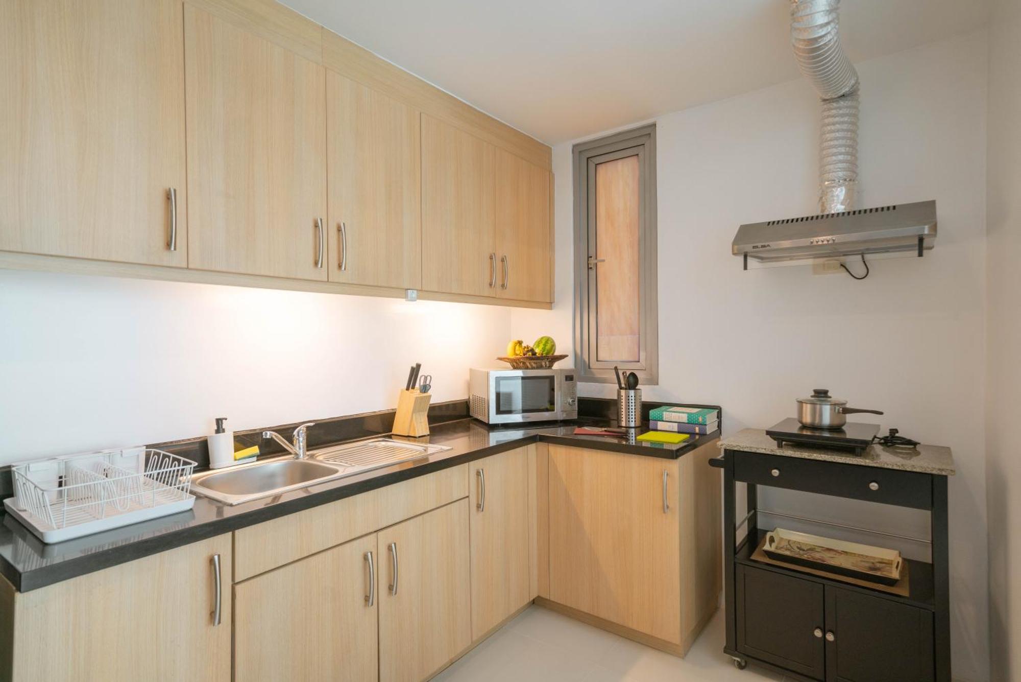 Prime Avant Bgc Location Apartments By Ph Staycation Manila Eksteriør bilde