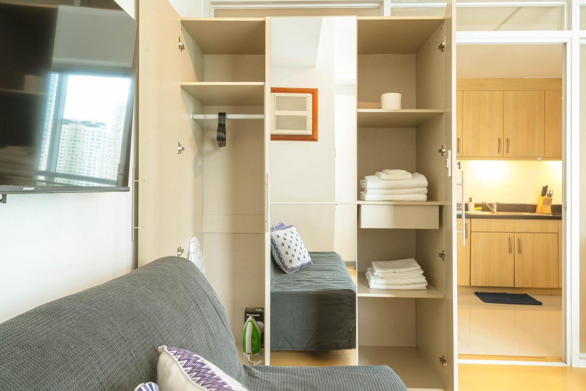 Prime Avant Bgc Location Apartments By Ph Staycation Manila Eksteriør bilde
