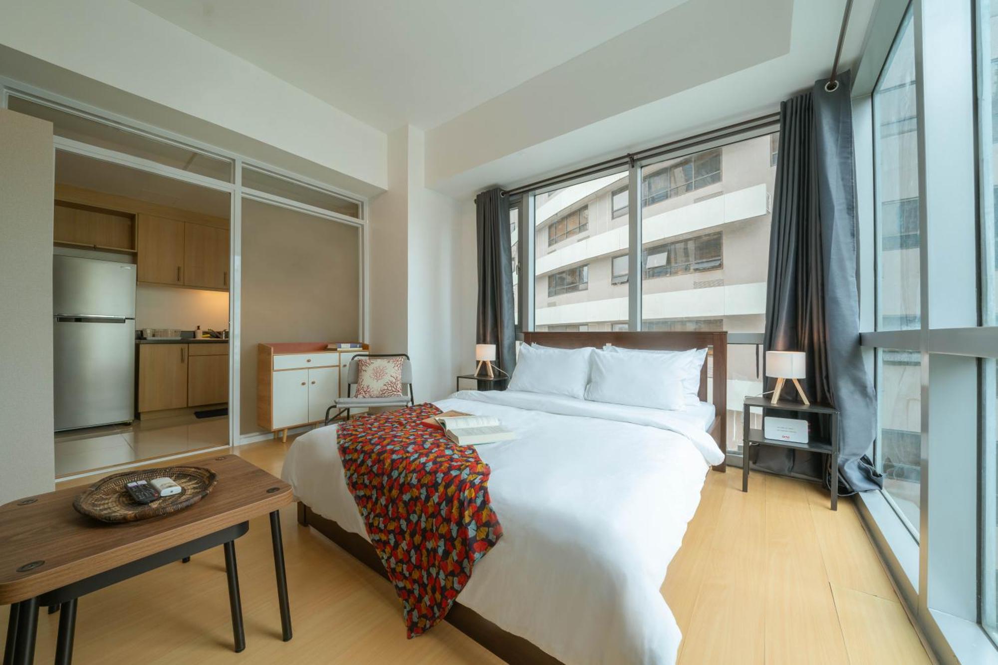 Prime Avant Bgc Location Apartments By Ph Staycation Manila Eksteriør bilde
