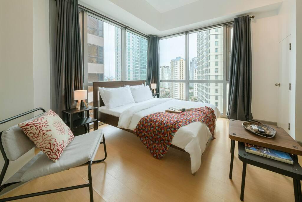 Prime Avant Bgc Location Apartments By Ph Staycation Manila Eksteriør bilde